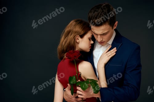 Preview: Beautiful couple charm hug lifestyle relationship rose luxury dark background