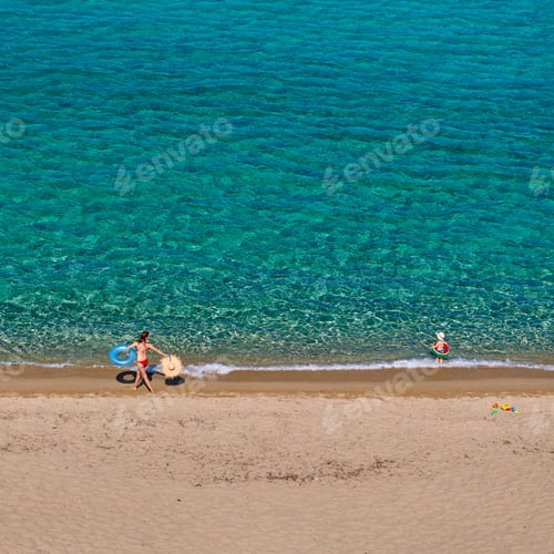 Preview: Two Year Old Toddler Boy On Beach With Mother. Summer Family Vacation. Sithonia, Greece.
