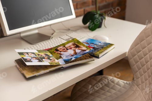 Preview: Family photos archive saved in brightly designed photo book, bright summer memories placed in the