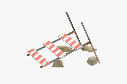 Aperçu: Barrière de chantier en mauvais état avec sacs de sable