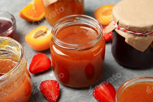 Preview: Composition with jam and ingredients on gray background, close up