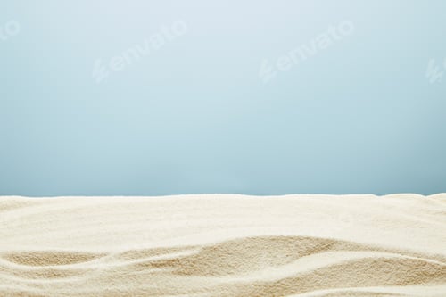 Preview: wavy textured golden sand on blue background