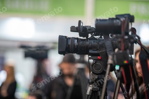 Preview: Media camera focuses on capturing the vibrant pulse of a buzzing media event
