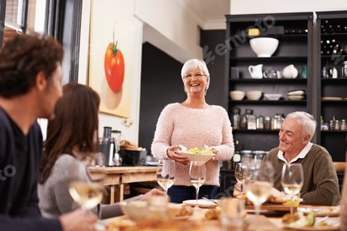 Preview: Friends and family are the true gifts in life. Shot of a family sitting down to dinner.
