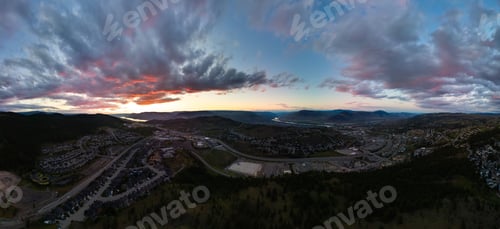 Preview: Residential Homes and Street in Kamloops, BC, Canada. Cloudy Dramatic Sunset