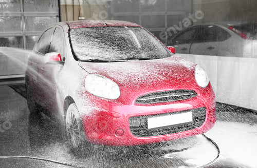 Preview: Cleaning automobile with high pressure water jet at car wash
