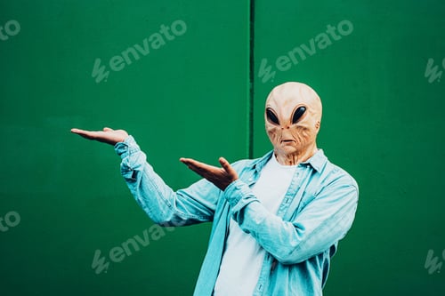 Preview: Portrait of ufo alien extraterrestrial mask with denim casual clothing like a human