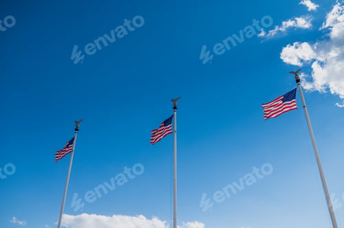 Preview: Low angle view of american flags on a pole