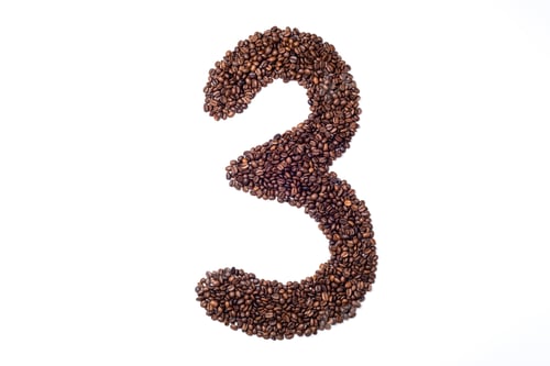 Preview: Number made with coffee beans on white background. Number 3 three made of coffee