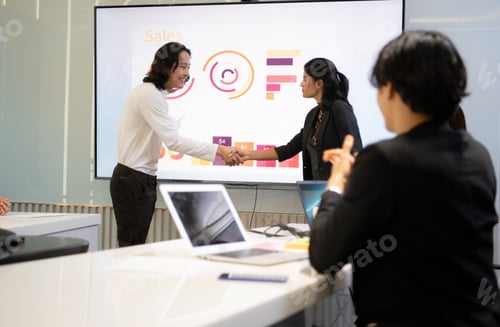 Preview: Business people having a meeting and present in a conference room at the office.