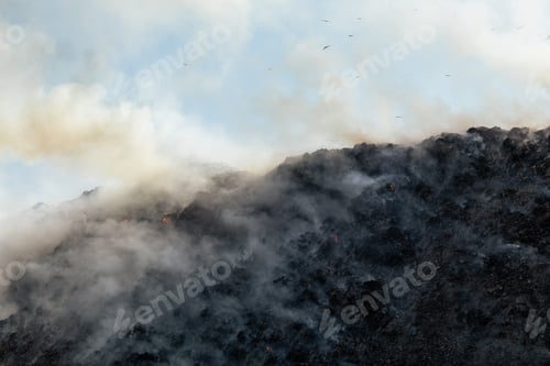 Preview: Landfill with burning trash piles