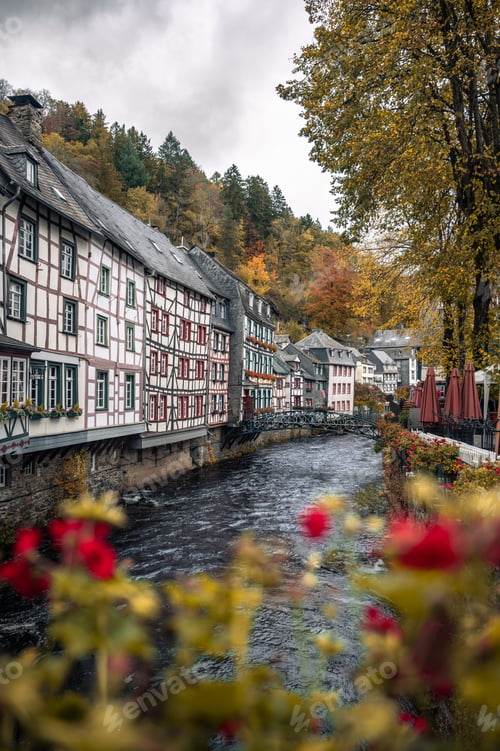 Preview: Picturesque Town Monschau with Historical Charm and the Tranquil Rur River in autumn