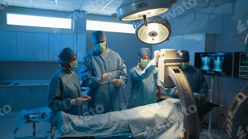 Preview: The medical team discussed the surgical options with the patient before proceeding with the operatio