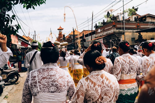 Preview: Hindu people on street near religious building