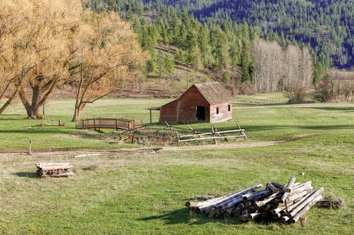 Preview: Woodpile and old barn in Idaho.