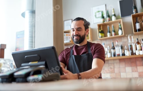 Preview: happy man or waiter at bar cashbox