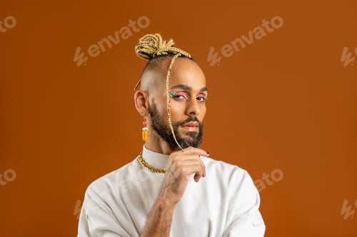 Preview: Black latin gay man isolated on orange background