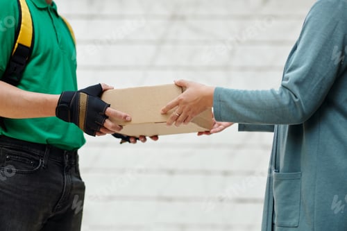 Preview: Delivery Man Giving Food to Customer