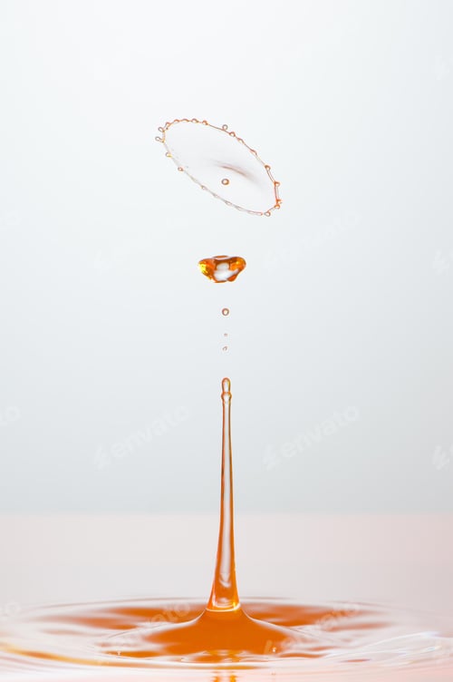 Preview: Splash of colorful liquid with high speed flash