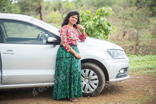 Preview: Beautiful young girl with car