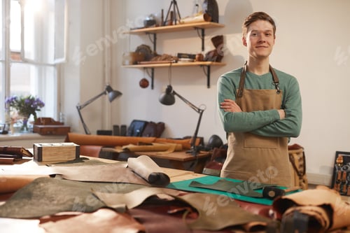Preview: Confident Young Man In Workshop