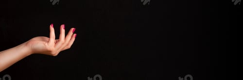 Preview: Elegant Hand with Red Polish on Black Background