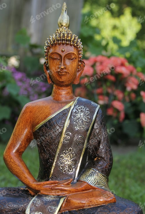 Preview: Buddha Statue in Outdoor Garden With Blurred Background