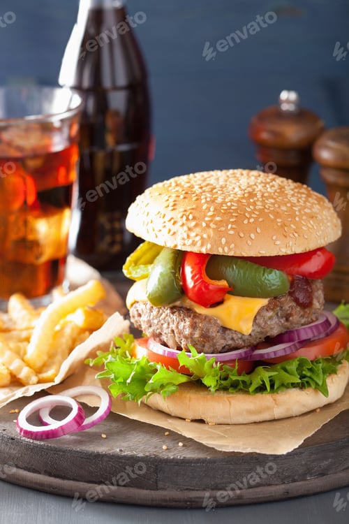 Preview: homemade cheese burger with peppers tomato onion