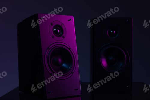 Preview: image photograph of the speaker system on a black background with purple atmospheric illumination