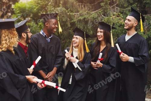 Preview: Group of multiethnic students on graduation day
