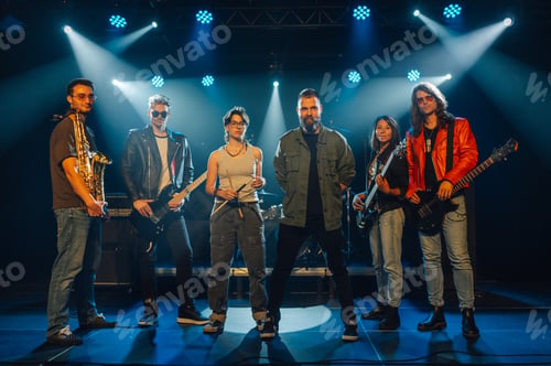 Preview: Music band posing on stage under blue lights