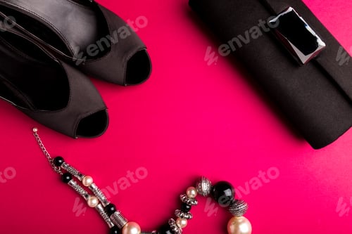 Preview: Black Clutch, Shoes, and Jewelry on Pink Backdrop