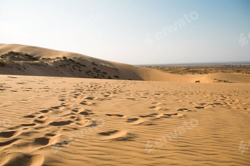Preview: A trail of footprints in the sand in the desert. Sarykum dune in Dagestan. Travel, natural