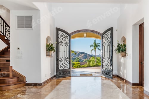 Preview: the entry way to a luxurious residence in the mountains is lined with marble floors