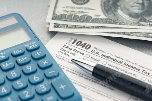 Preview: Tax form, calculator, money and pen on table