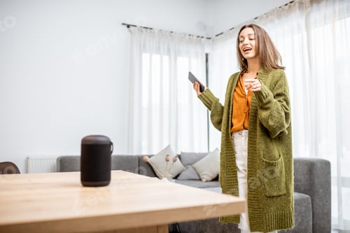 Preview: Woman controlling home devices with a voice commands
