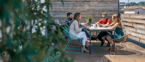 Preview: Office workers working on the terrace