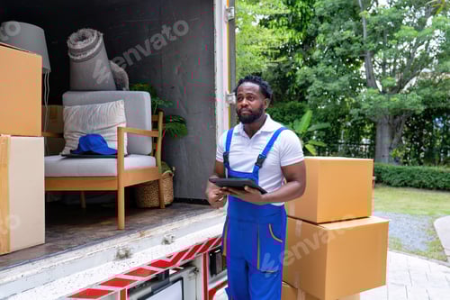 Preview: Delivery house move cargo truck service man checking box list from digital tablet for signature