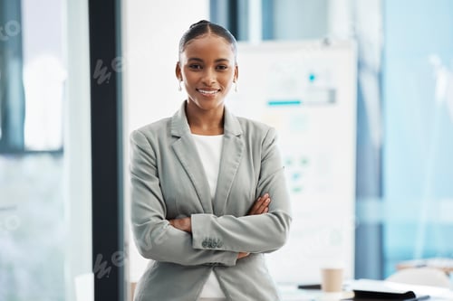 Preview: Professional, corporate businesswoman with arms crossed, in position of leadership, in marketing st