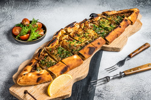 Preview: Turkish bread pide, Turkish pizza. White background. Top view