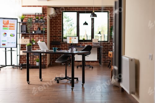Preview: Nobody in startup office with desks and technology