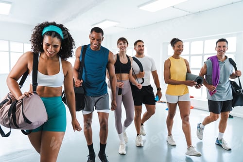 Preview: Happy athletes leaving gym after functional training workout