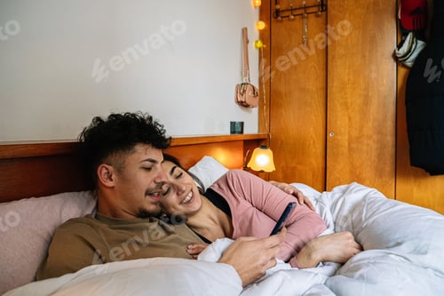 Preview: Couple Enjoying Time Together in Bed