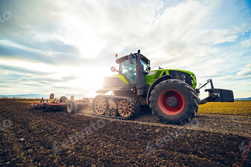 Preview: Modern tractor working on the farm, a modern agricultural transport
