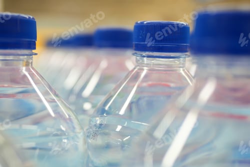 Preview: plastic bottles of soft drink on table