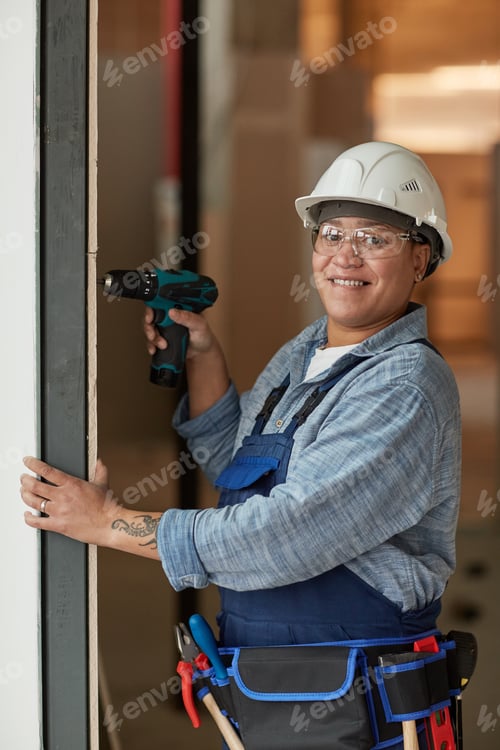Preview: Smiling Woman Enjoying Work at Construction Site