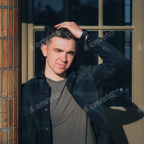 Preview: a young man looking at the camera