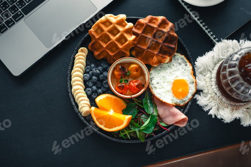 Preview: breakfast waffles with Fried Eggs fruit and ham.