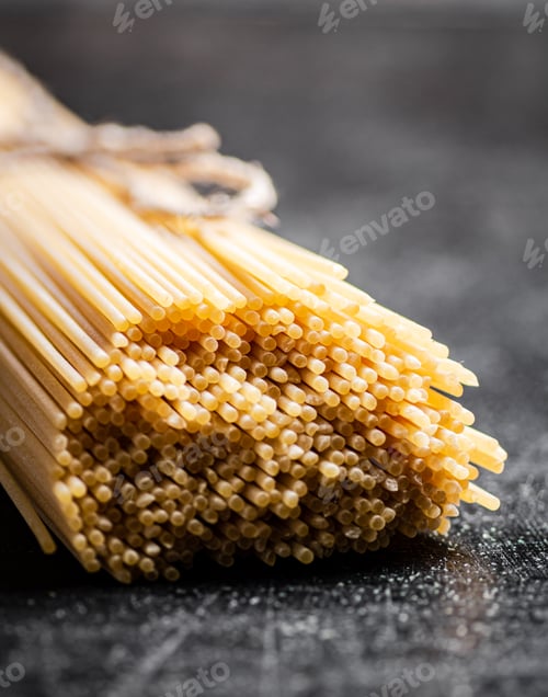 Preview: A bunch of spaghetti dry on the table.