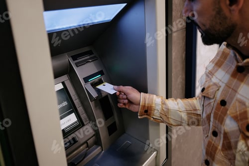 Preview: Unidentified Man at ATM for Cash Withdrawal